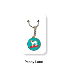 Dog on a Surfboard Enamel Keyring